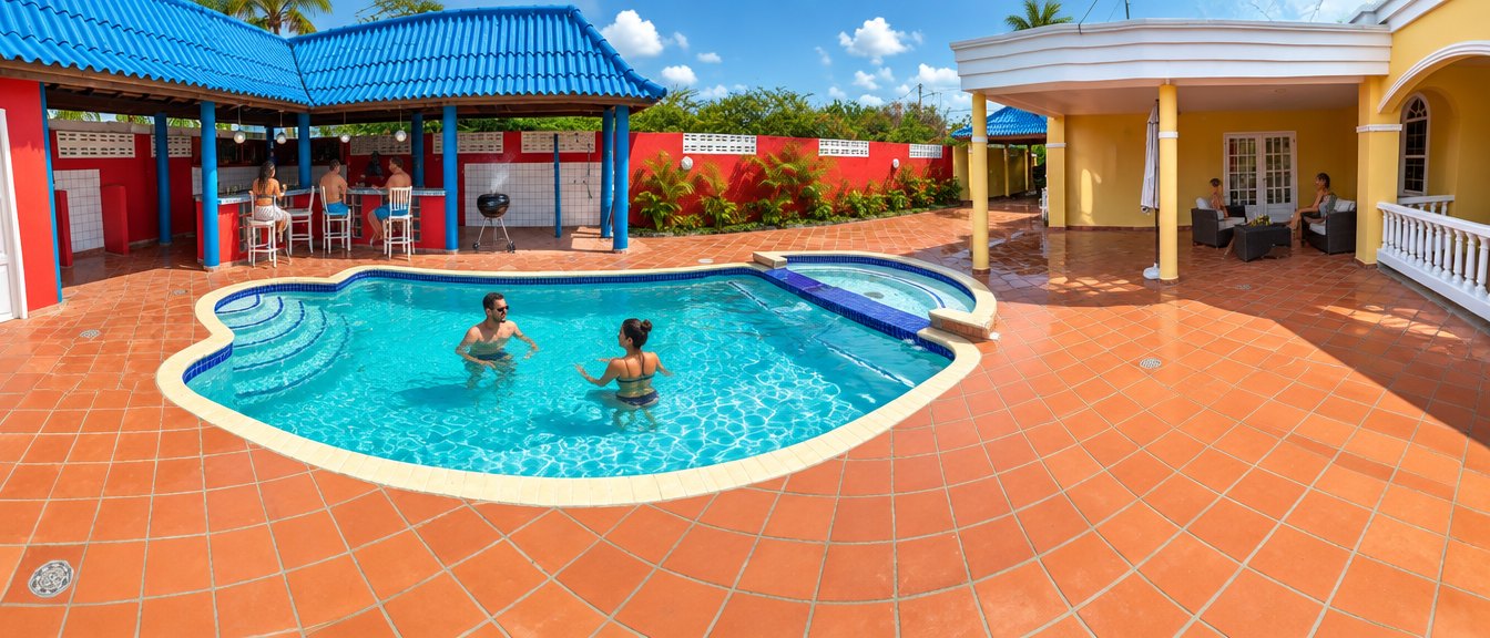 Guests in the private pool, at the pool bar and on the porch on a sunny afternoon